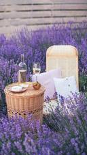 Wicker Chair and Table with Glass of Wine