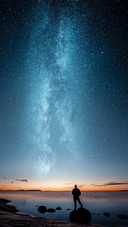 Man Standing Alone Under The Stars