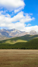 Clear clouds drift over the plateau