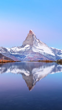 Majestic Mountain Reflects in Crystal Clear Lake