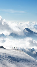 Climbers Climbing the Mountain with Mountain Equipment