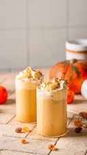 Autumn pumpkin spice latte with whipped cream