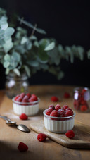 Italian dessert panna cotta with raspberries