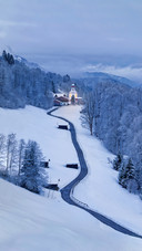 Winter Landscape With Church  in The Mountains