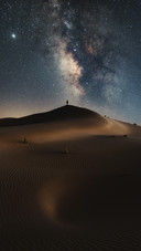 Man Standing in The Desert Under The Stars