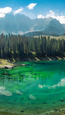 The serene scenery along the shore of lake donomiti