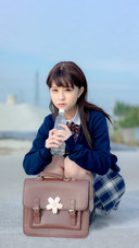 Girl Student in School Uniform Japanese Style with Blue Sky