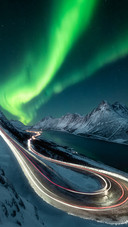 Aurora, starry sky, and snow mountains