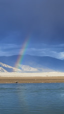 Rainbow appears twice in the sky after the rain.