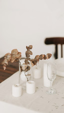 Beautiful artificial flower close-up in a vase on a table
