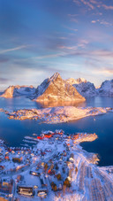 Colorful Landscape with Blue Sea and Snowy Mountains
