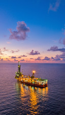 Tender Drilling Oil Rig in the Middle of the Ocean