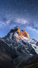 Beautiful Snow-capped Mountains Under The Stars
