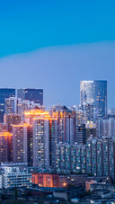 Which is bigger the highrise building or the lowrise buildin
