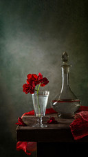 Modern still life with a geranium on a dark background