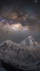Snow Mountain Under Beautiful Starry Sky