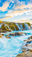 Incredible summer sunrise on Bruarfoss Waterfall
