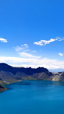 The clouds of tianchi lake reflect the snowcapped peaks