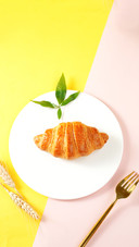 Bread and Croissant Placed in the Tableware