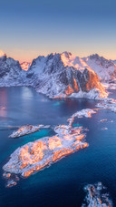 Aerial Photography of Snowy Mountains And Sea