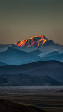 The sunrise over mount cho oyu reflects the morning light