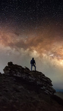 Man Standing Alone Under The Stars