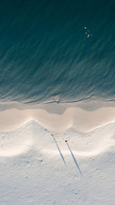 Basking in the sunshine by the jarvis bay beach