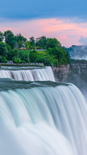 Waterfalls in the state park Niagara Falls in cloudy dusk