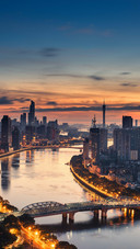 Beautiful City View by The River in The Sunset