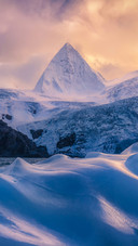 The Mysterious Snow Mountain Stands in Front