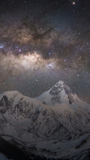 Beautiful Starry Sky And White Snow Mountains