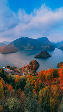 The autumn scenery of bailong lake is ablaze with colors