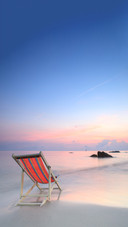 Sunbed on Sunrise of the Ocean, Thailand
