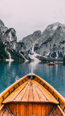 Wood boat in sea hills