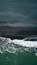 The waves meet the shore