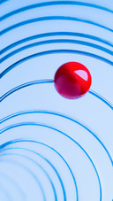 The red sphere on the metal wire