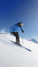 Skier in High Mountains