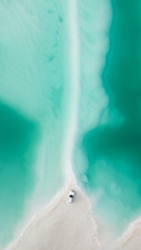 A Car Parking on the Beach of the Sea