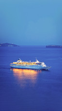 Luxury Cruise Ship Sailing at Sunset