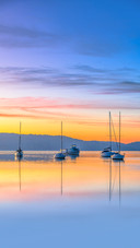 A sunrise with high - cloud reflections on Brisbane Water