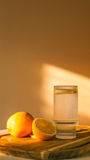 Glass of water with lemon, good morning concept