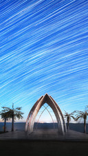 Sunset over the star trails of xiao erhai lake