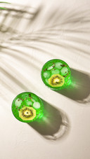 Two Green Drinks with Ice and Slice of Kiwi