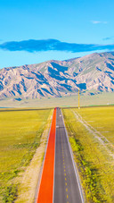Mountains and straight roads