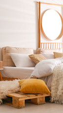 Stylish modern room interior with comfortable bed