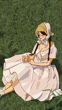 A Girl in a Headscarf Was Sitting on The Grass
