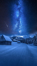 Snowy Mountains And Houses Under The Stars
