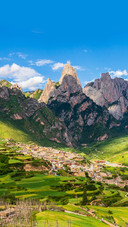 A village hidden by stones