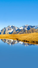 Beautiful reflection in Koruldi lake, Caucasus foothills