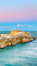 Beautiful coastal town on the rocks in Puglia